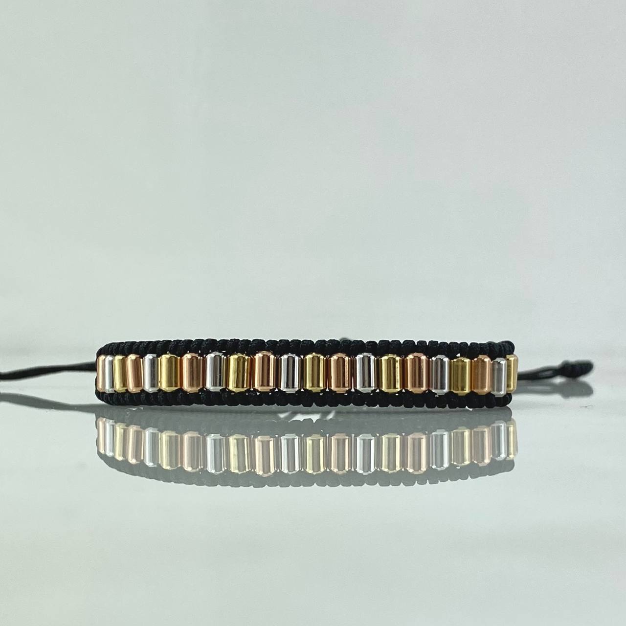 Pulsera Negra 1gr / 4mm Cilindros Lisos Tres Oros 18K *