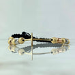 Pulsera Negra Herraje Cruz Lisa 4.7gr / 7mm Bolas Diamantadas Cilindro Liso Tres Oros 18K *