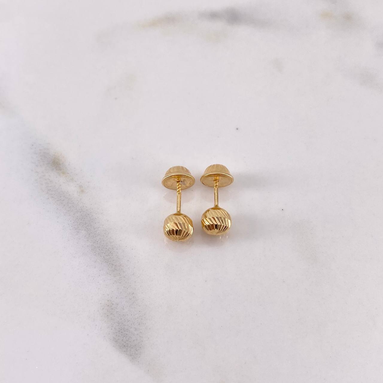 Topos Bola 0.6gr / 5mm Diamantados Oro Amarillo 18K $