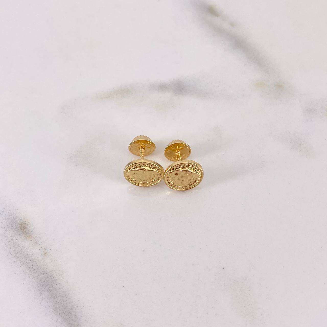 Topos Medusa 0.7gr / Lisos Oro Amarillo 18K $