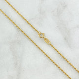 Set Cadena Lazo 1gr / 50cm / 1.2mm + Dije Cruz 0.3gr / 1.6cm Cargador Bordeado 1.3gr / Oro Amarillo 18K (Oferta)