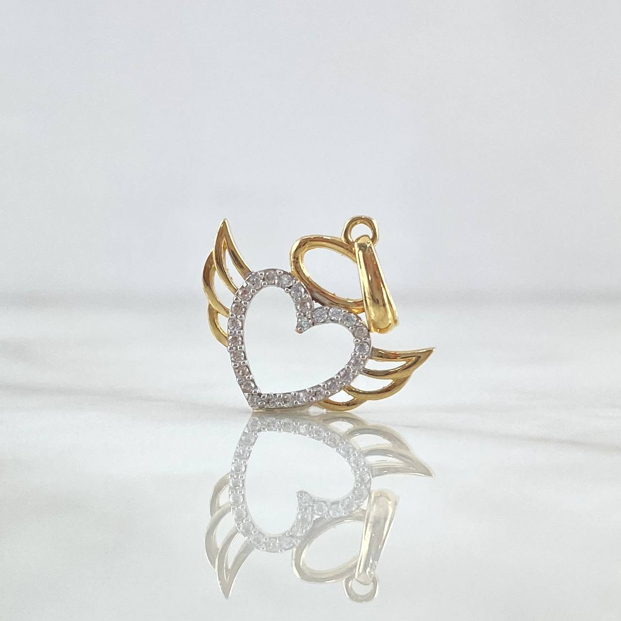 Dije Corazón Alado 1.55gr / 2.3cm / Circones Blancos Oro Amarillo 18K *