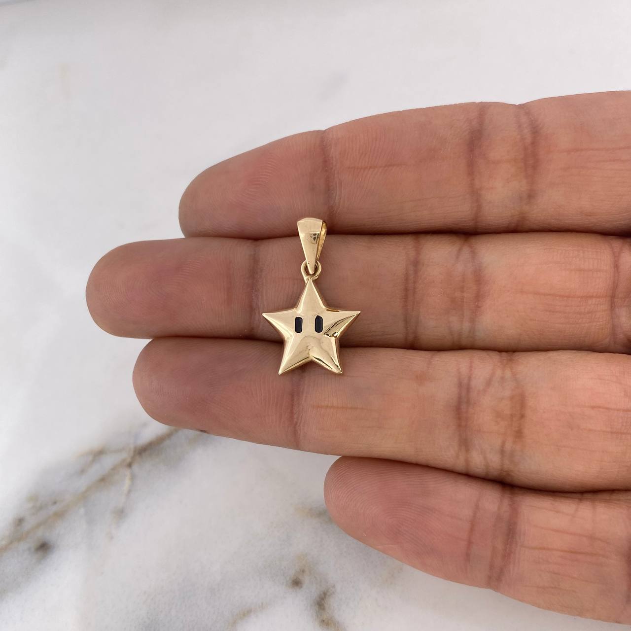 Dije Estrella  1.3gr / 2.1cm / Oro Amarillo 18K #