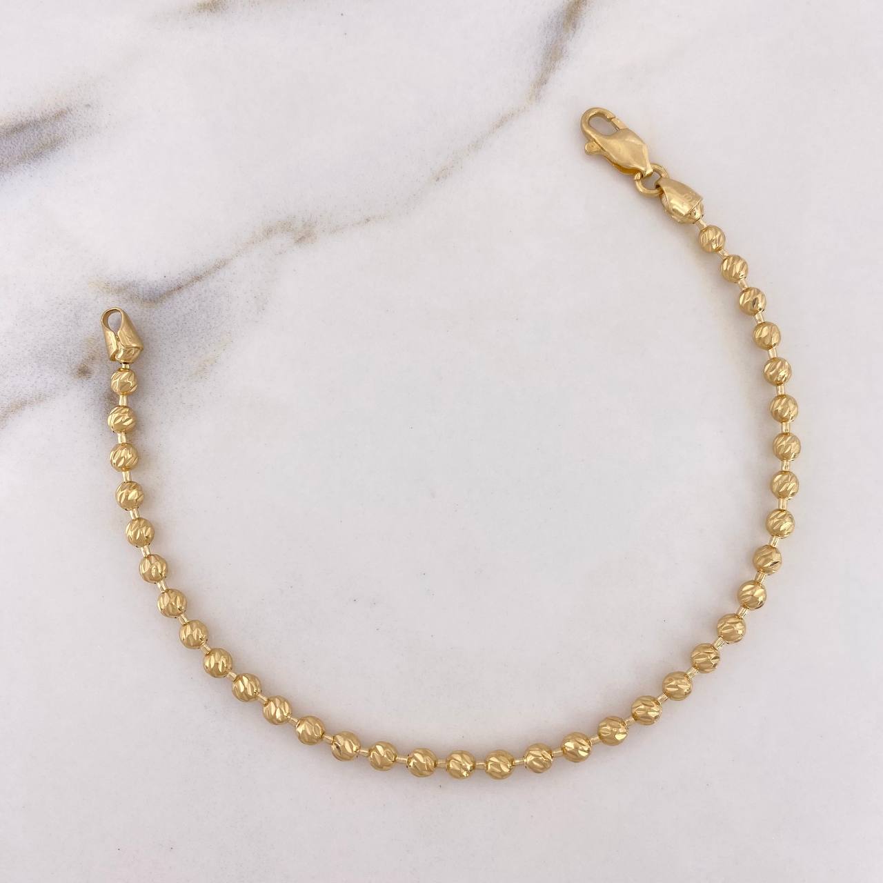 Pulso Militar 6.95gr / 21cm / 2.9mm Bolas Diamantadas Oro Amarillo 18K $