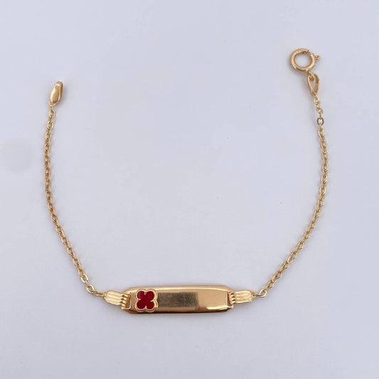 Pulso Bebe Aro Seguido 1.4gr / 13.9cm / Placa Rectangular Curva Trebol Rojo Oro Amarillo 18K &