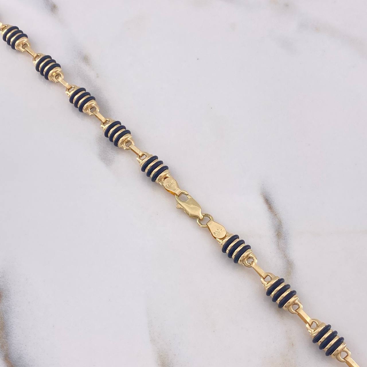 Cadena Rustica 18.4gr / 70cm / 5.75mm Barril Cauchos Negros Oro Amarillo 18K $