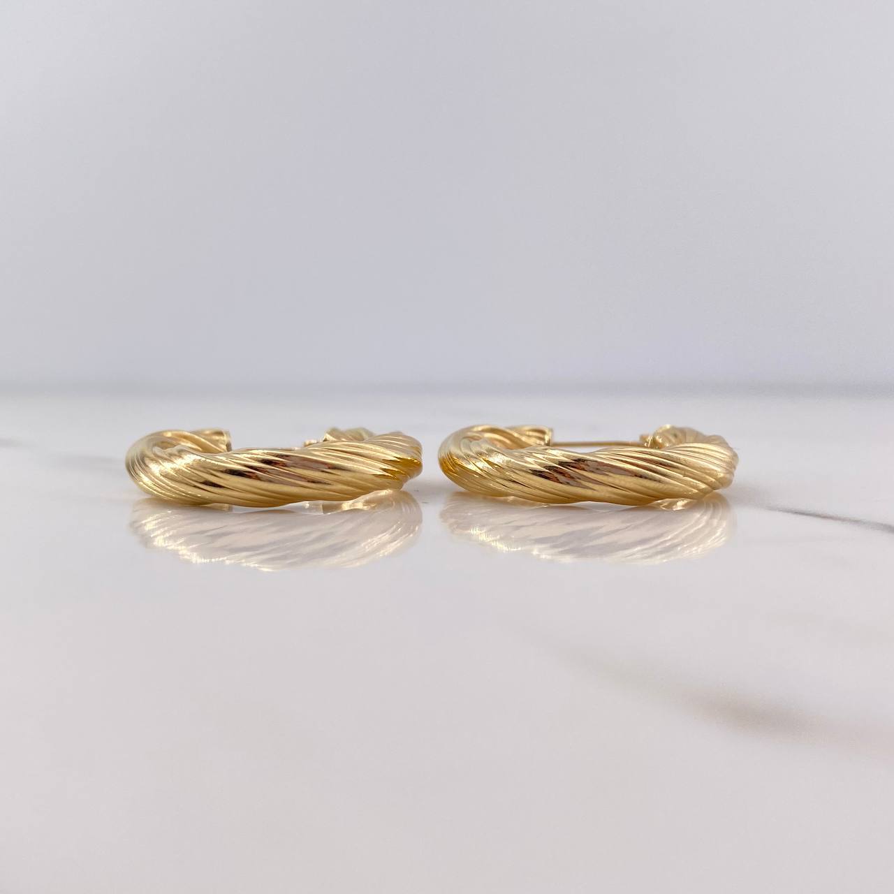 Candongas Ingri 3.25gr / 2.5cm / Espiral Entorchadas Oro Amarillo 18K $