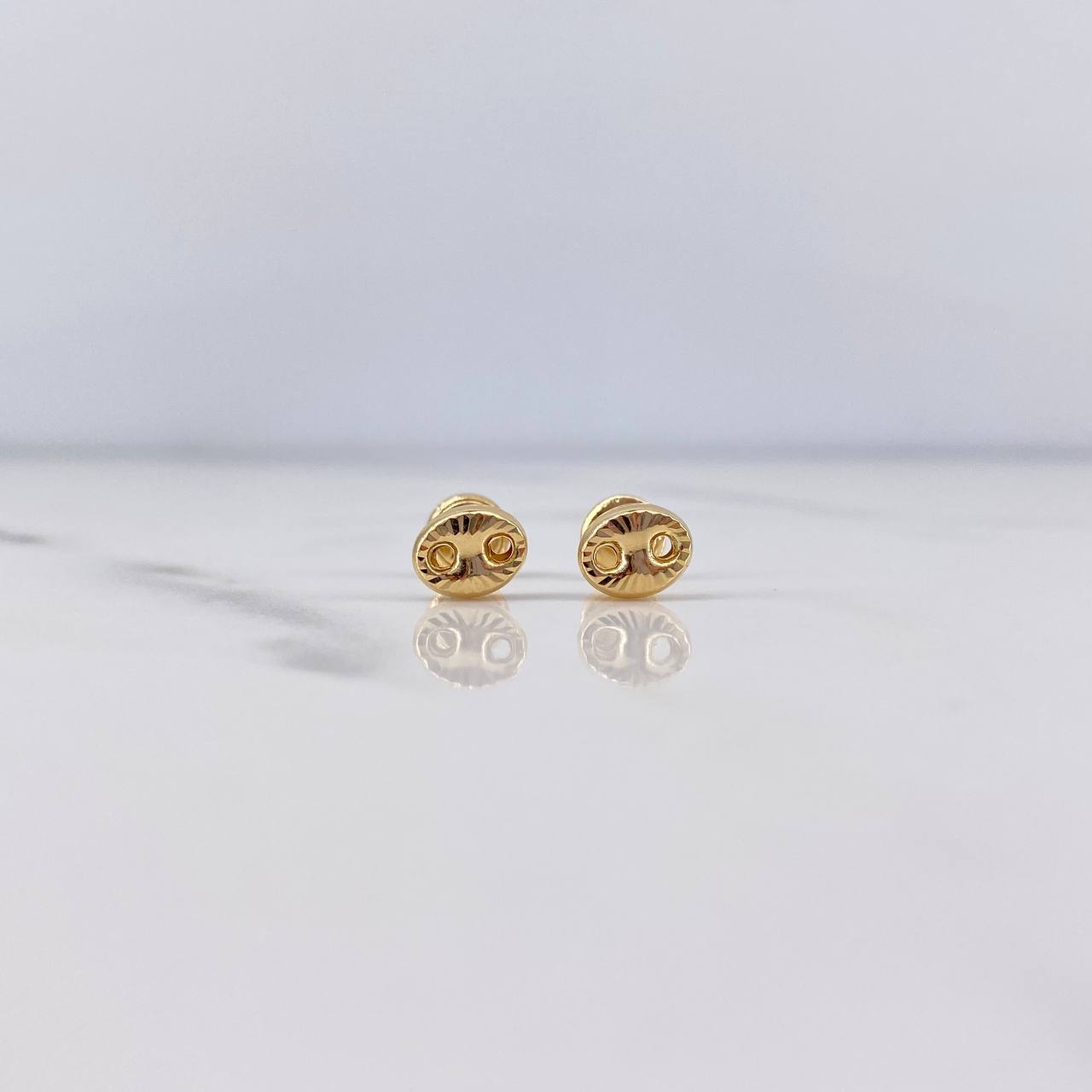 Topos GC 0.7gr / 6.7mm Diamantados Oro Amarillo 18K $