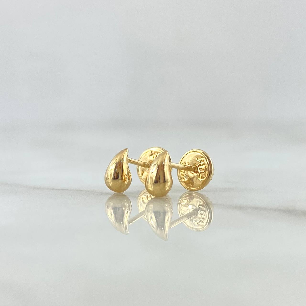 Topos Gotas 0.45gr / 6mm Lisas Oro Amarillo 18K