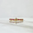 Anillo Estrellas 2.35gr-T6 3/4 Circones Fucsias y Blancos Oro Amarillo