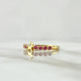 Anillo Estrellas 2.35gr-T6 3/4 Circones Fucsias y Blancos Oro Amarillo