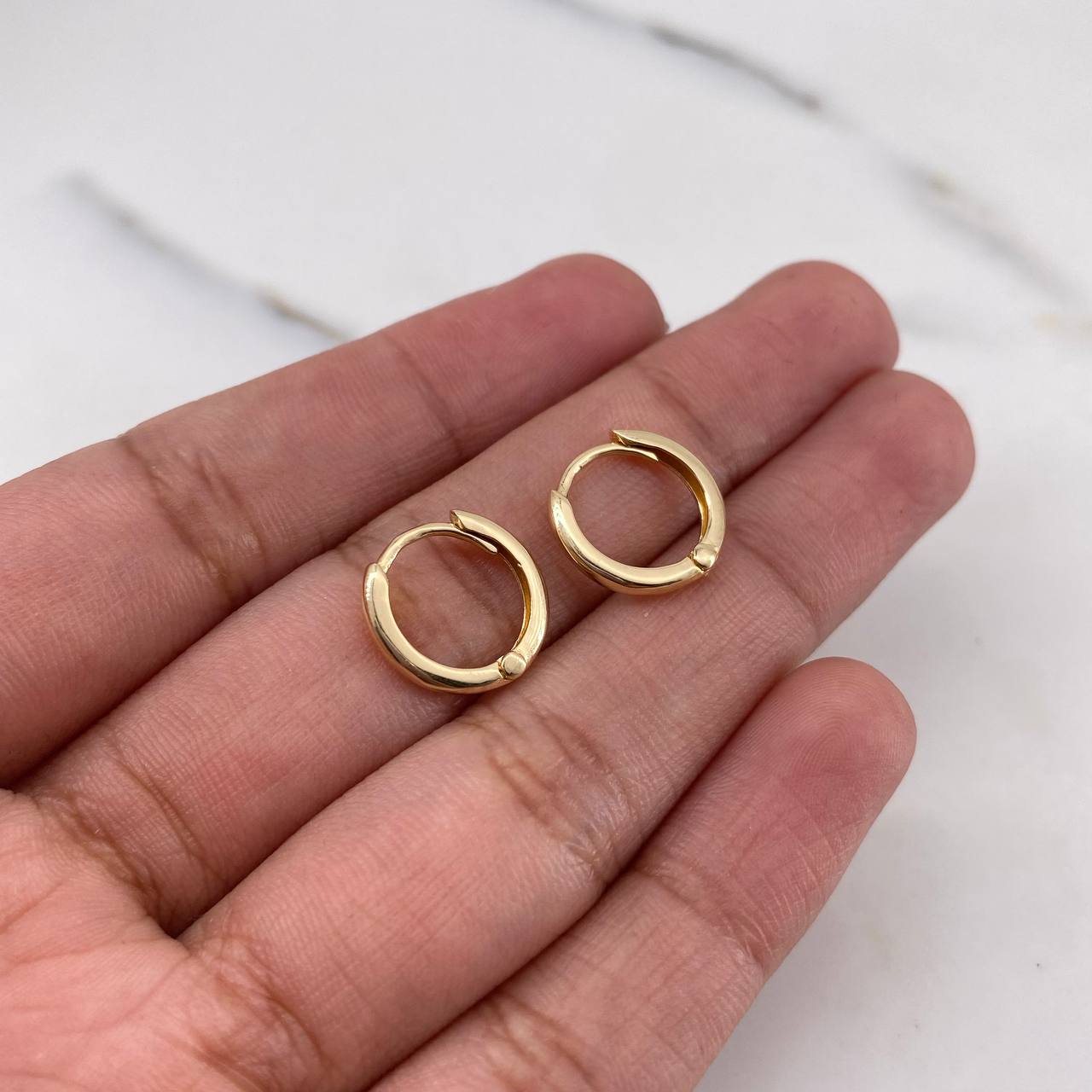 Candongas Lia 1.6gr / 1.2cm / Lisas Oro Amarillo 18K $