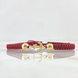 Pulsera Vinotinto Herraje de Ancla 0.55gr / 5mm Bolas Lisas Oro Amarillo 18K