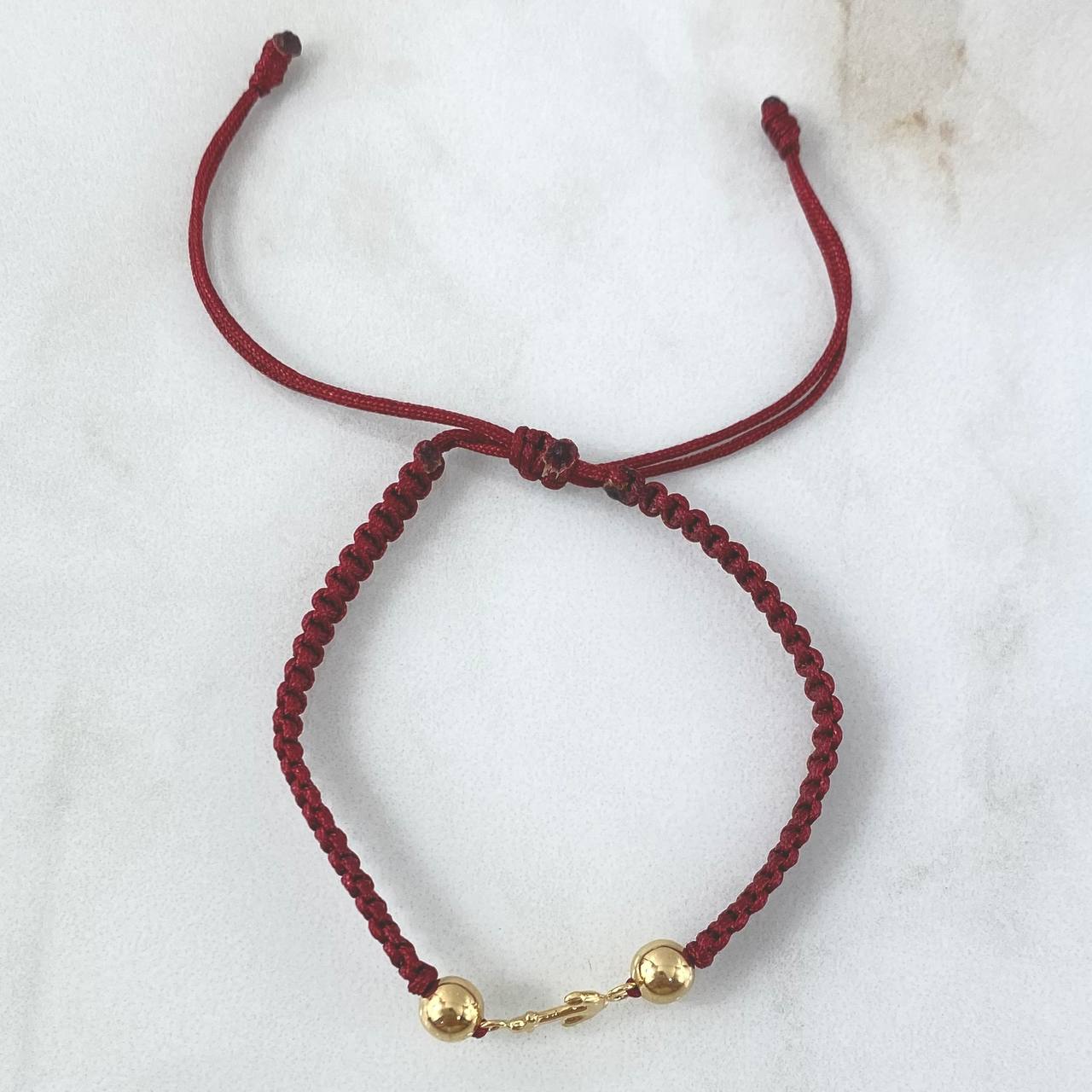 Pulsera Vinotinto Herraje de Ancla 0.55gr / 5mm Bolas Lisas Oro Amarillo 18K