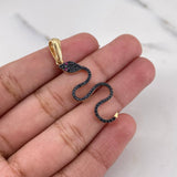 Dije Serpiente 2.1gr / 4cm / Circones Fucisas Negros Dos Oros Negro Amarillo 18K $