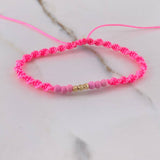 Pulsera Rosada Bolas Diamantadas 0.3gr / 3mm Neoprenos Rosados Oro Amarillo 18K $