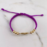 Pulsera Morada Silueta Corazon 1.25gr / 1.7cm / 4mm Bolas Diamantadas Oro Amarillo 18K $