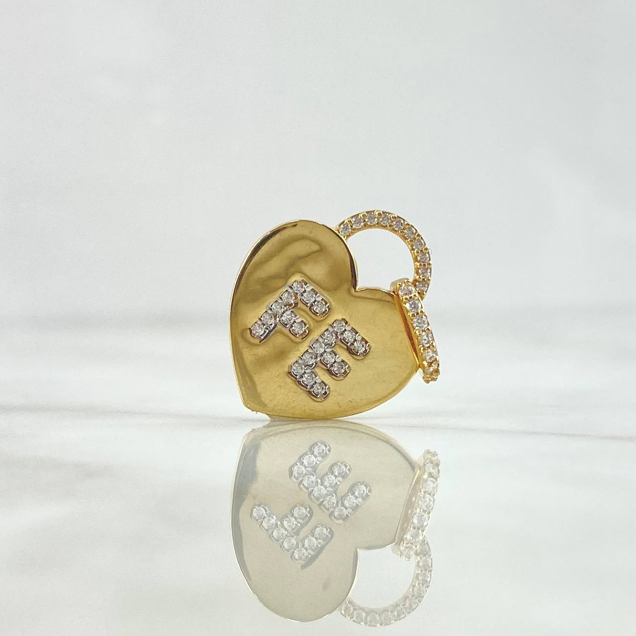 Dije Corazón Fe 2.65gr / 2.5cm / Circones Blancos Oro Amarillo 18K ©