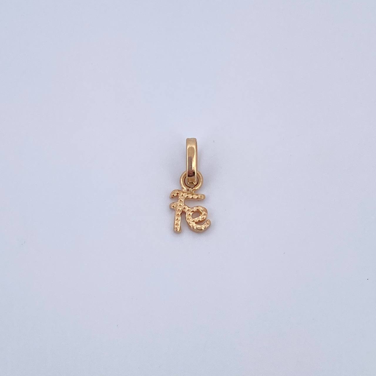 Dije Fe 0.45gr / 1.3cm / Oro Amarillo 18K &