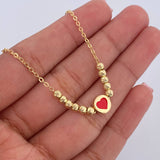 Cadena Aro Seguido Corazon 2.75gr / 41.3cm / 1.2mm Bolas Diamantadas Oro Amarillo 18K &