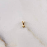 Dije Bisel 0.2gr / 0.8cm / Esmerdalda 3pts Oro Amarillo 18K &