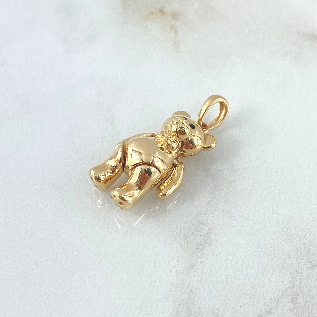 Dije Oso Articulado Liso 4gr / 2.6cm / Con Moño Oro Amarillo 18K ©