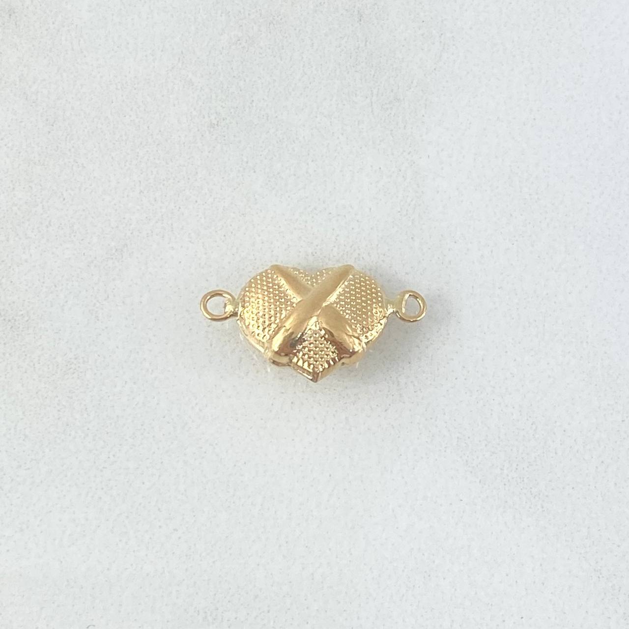 Herraje Corazón Texturizado 0.6gr / 1.7cm / Cruzado Oro Amarillo 18K