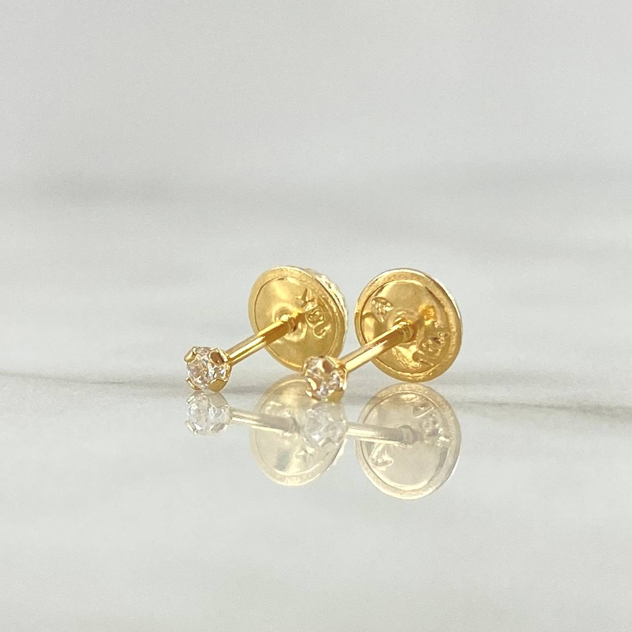 Topos Cuatro Garras 0.4gr / 2mm Circon Blanco Oro Amarillo 18K