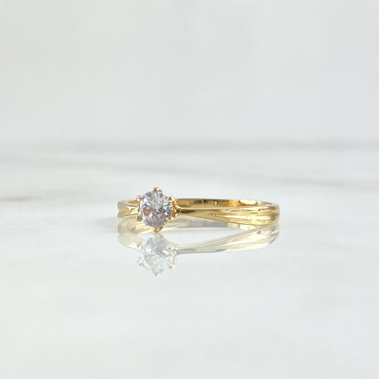 Anillo Solitario Espringado 1.3gr / T6 1/4 / Circon Blanco Oro Amarillo 18K