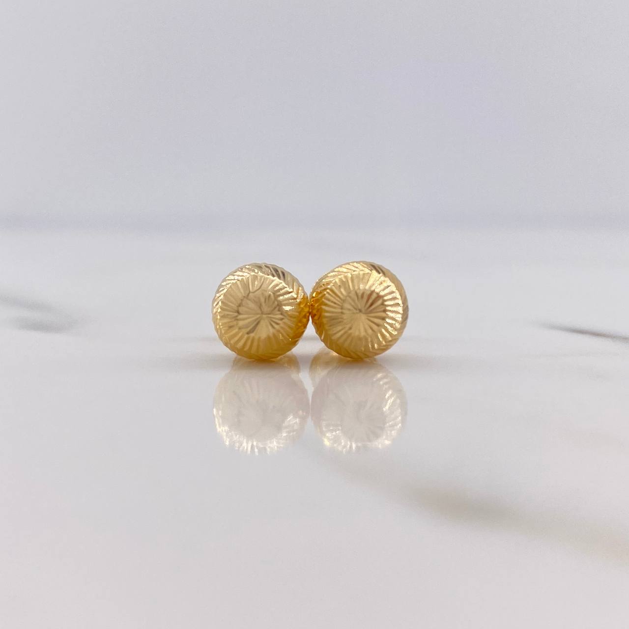 Topos Bola 0.95gr / 7mm Diamantados Oro Amarillo 18K $