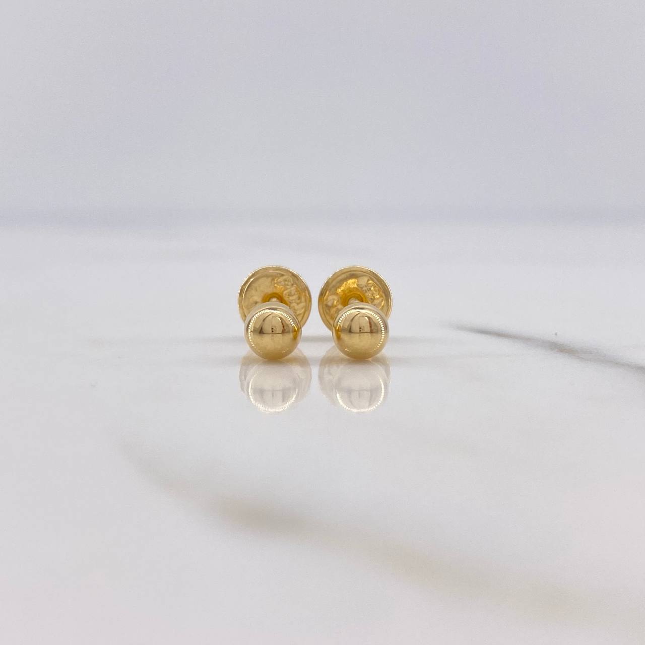 Topos Bola 0.55gr / 4mm Lisos Oro Amarillo 18K $