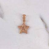 Dije Estrella 1.25gr / 2.2cm / Circones Blancos Oro Rosa $