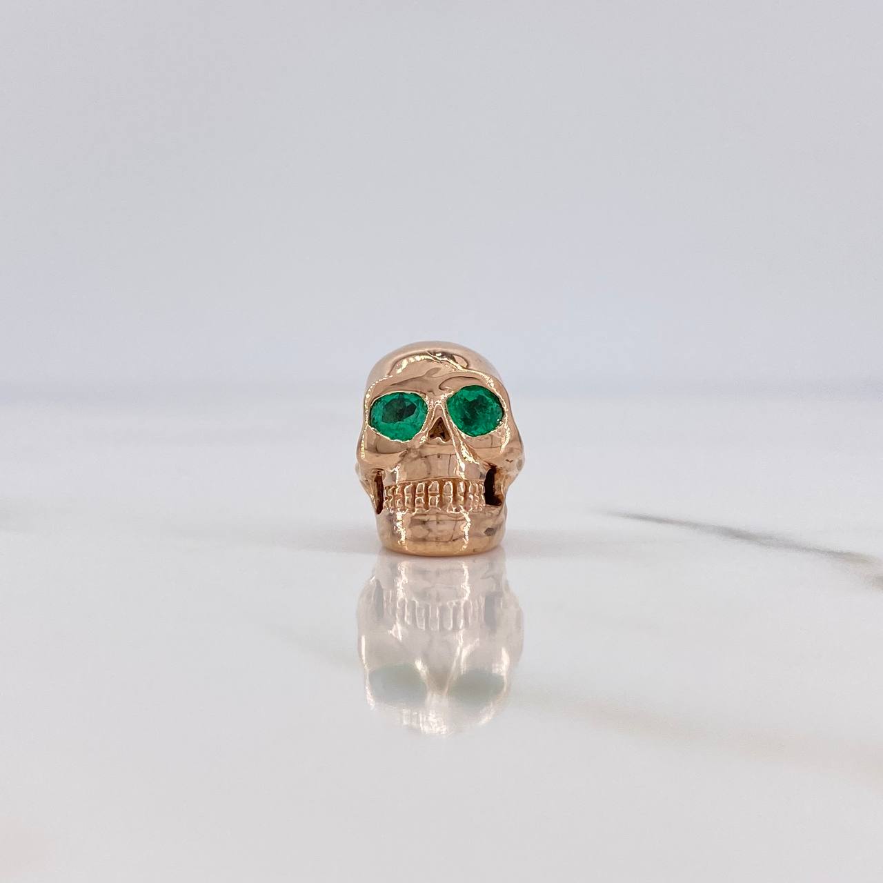 Herraje Calavera 4.5gr / 1.3cm / Esmeralda 1.6 Qts Oro Rosa 18K (Joya) $