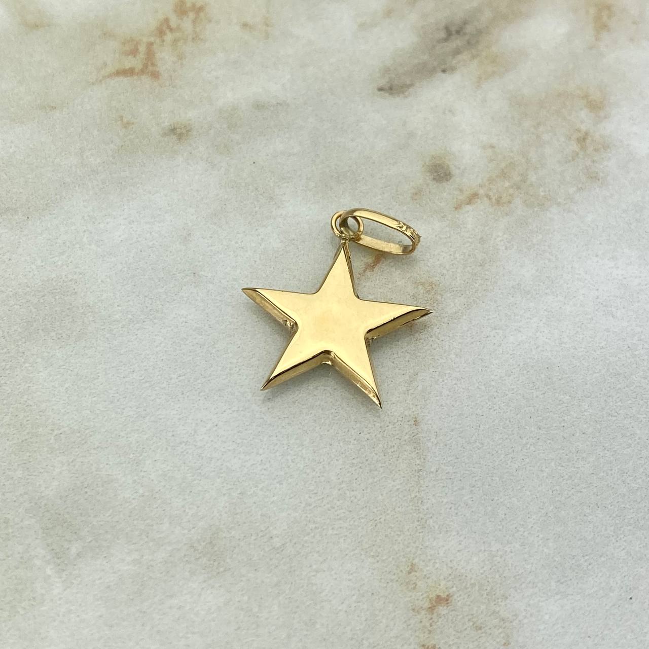 Dije Estrella 0.9gr / 2.4cm / Troquelado Oro Amarillo $