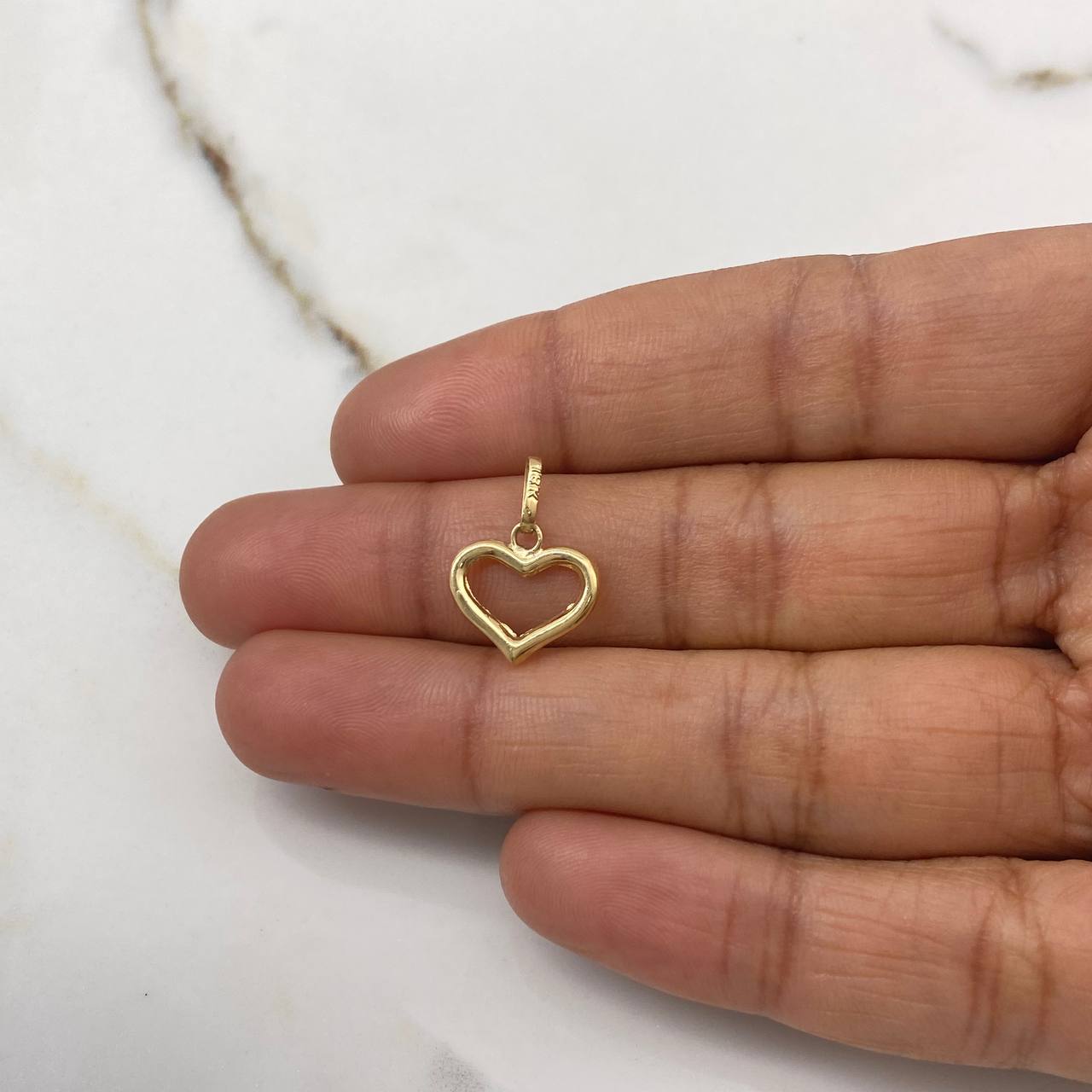 Dije Corazón Silueta 0.4gr / 1.5cm / Troquelado Pequeño Oro Amarillo $