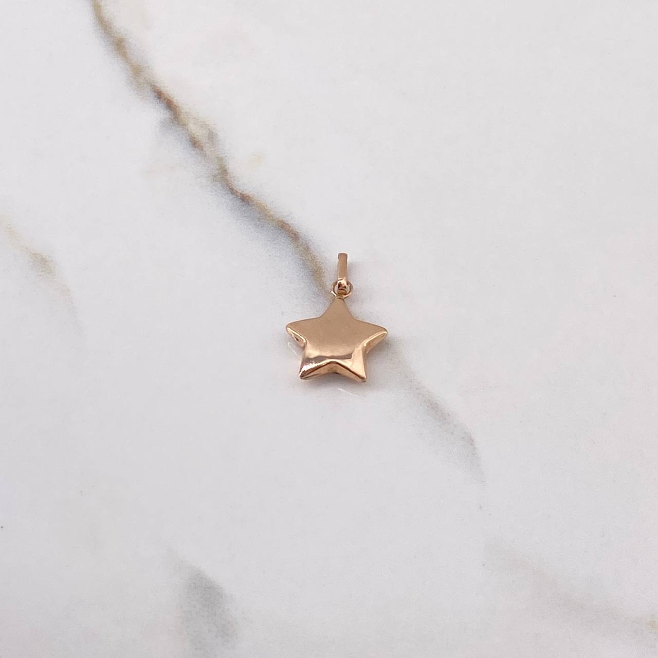 Dije Estrella 0.75gr / 2.2cm / Soplado Oro Rosa $