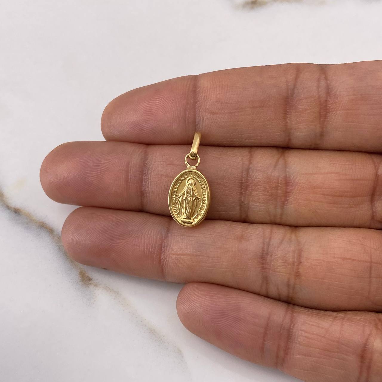 Dije Virgen Milagrosa 0.8gr / 2cm / Troquelado Oro Amarillo $