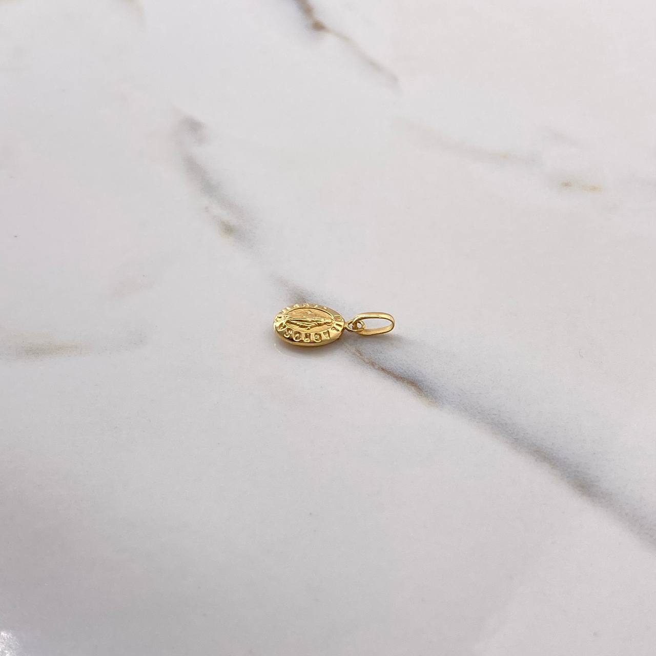 Dije Virgen Milagrosa 0.4gr / 1.7cm / Troquelado Oro Amarillo $