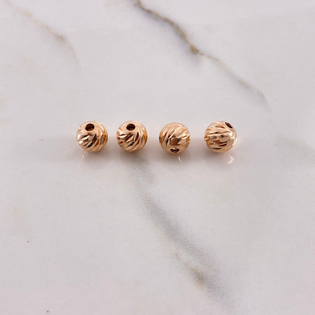 Bola Diamantada 0.45gr / 8mm Oro Rosa $