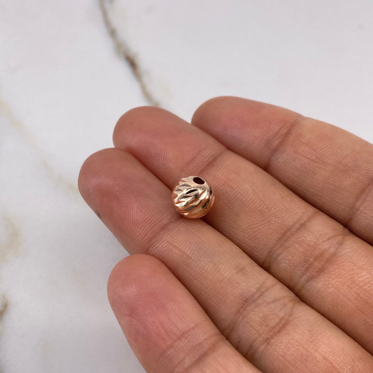 Bola Diamantada 0.45gr / 8mm Oro Rosa $