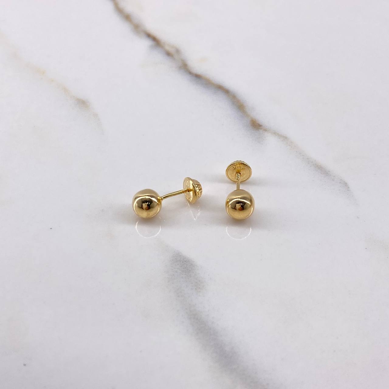 Topos Bola 0.7gr / 6mm Lisa Oro Amarillo $