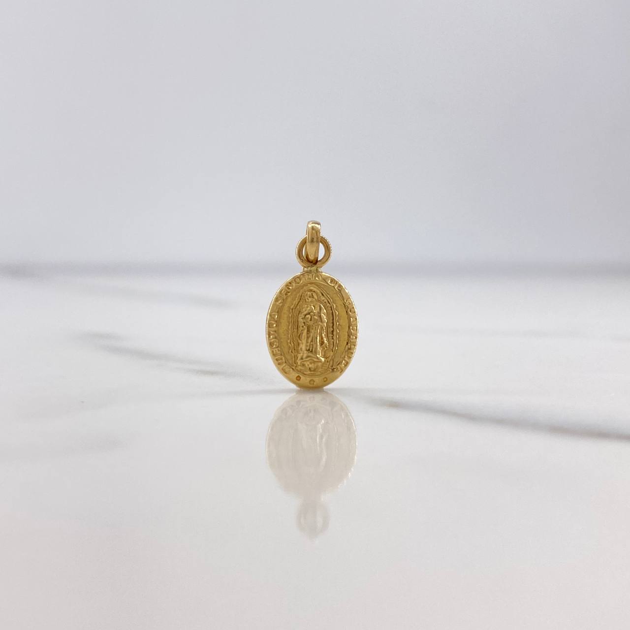 Dije Virgen Guadalupe 0.65gr / 1.9cm / Troquelado Oro Amarillo $