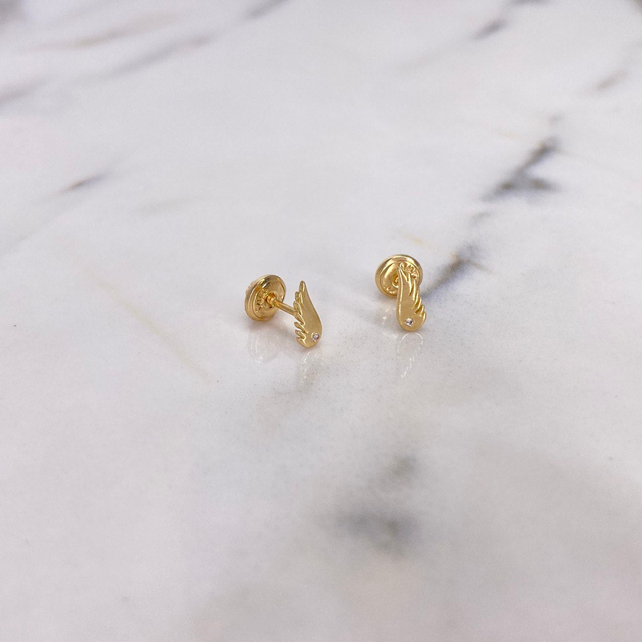 Topos Alas 0.8gr / Circon Blanco Oro Amarillo $