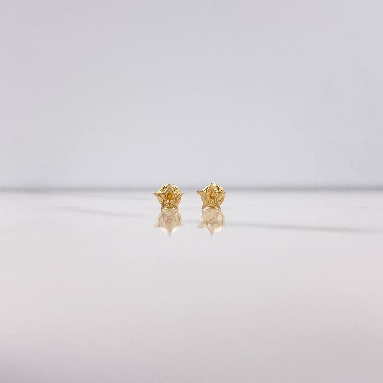 Topos Silueta Estrella 0.6gr / Lisos Oro Amarillo $