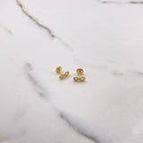 Topos Infinito 0.9gr / Circones Blancos Oro Amarillo $