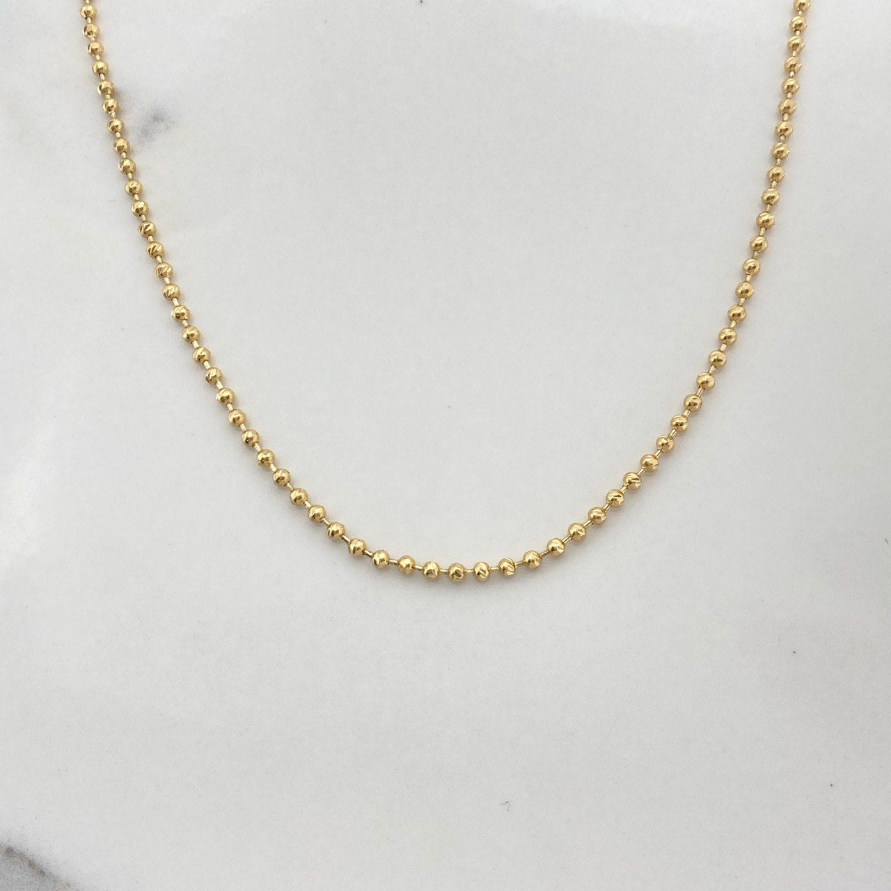 Cadena Militar 13gr / 55cm / 2.5mm Bolas Diamantadas Oro Amarillo $