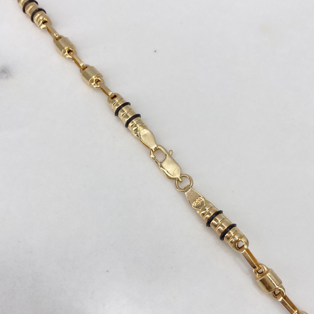 Cadena Rustica 14.7gr / 65cm / 4mm Barril Canotillo Cauchos Oro Amarillo $