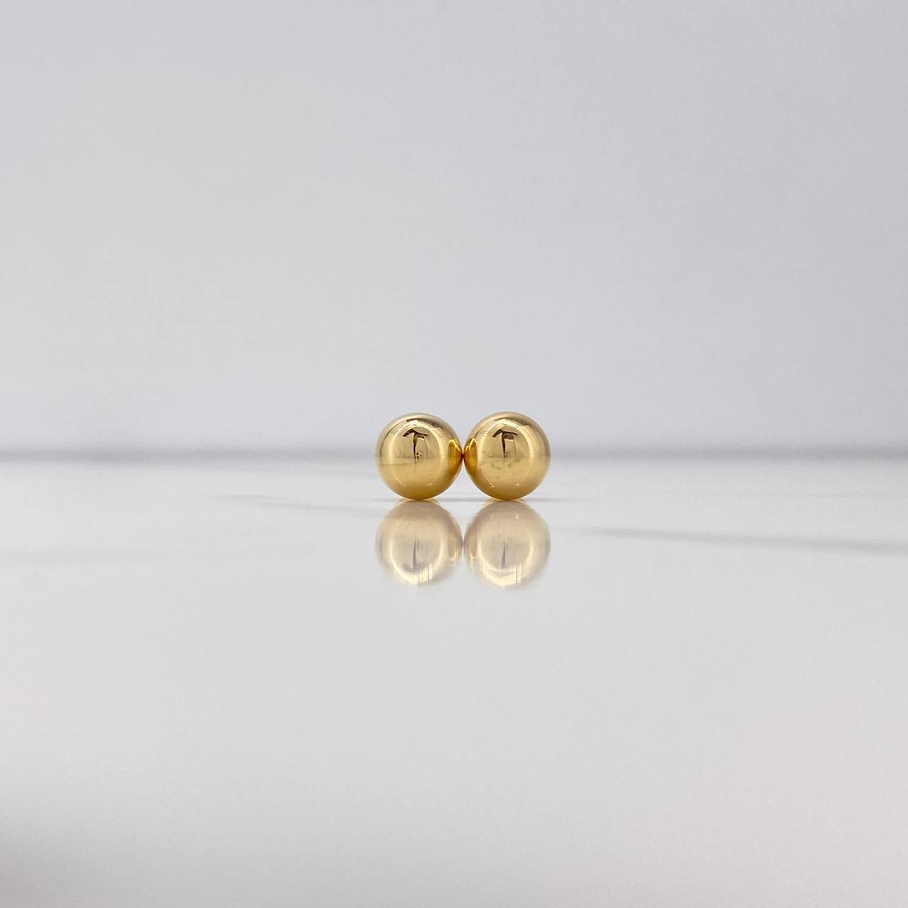 Topos Bola 0.85gr / 8mm Lisa Oro Amarillo $