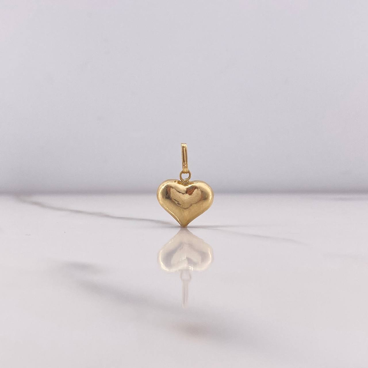 Dije Corazon Soplado 0.65gr / 1.7cm / Liso Oro Amarillo $