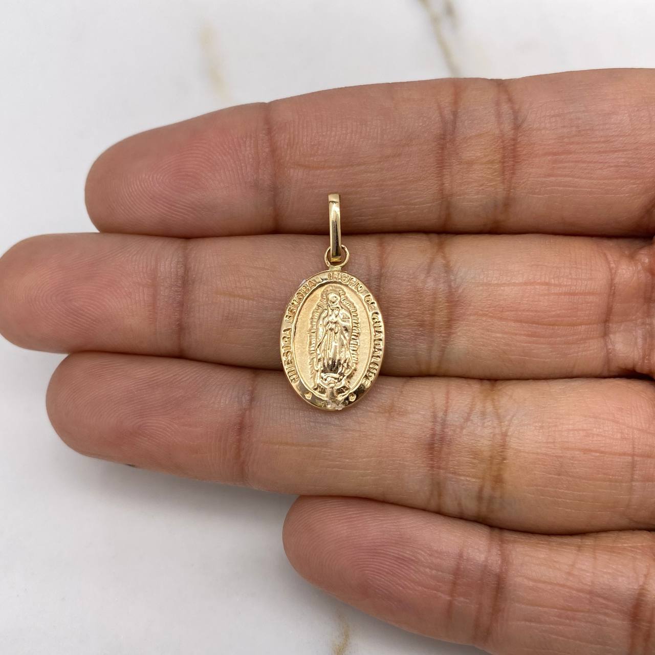 Dije Virgen Guadalupe 0.95gr / 2.5cm / Troquelado Oro Amarillo $